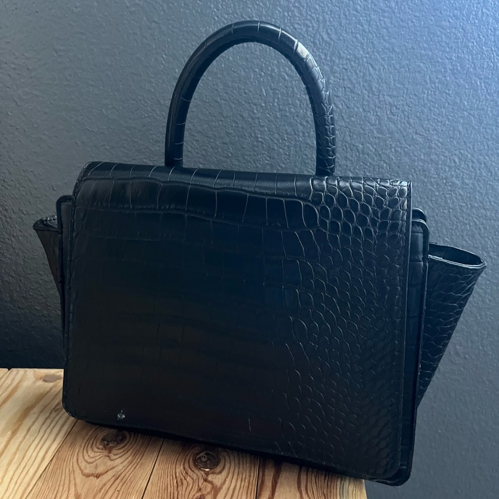 Black snake skin handbag